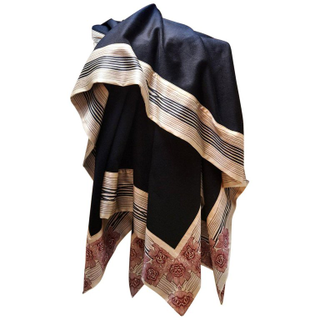 Illustration for article titled Behold Beauty in a Black. Now Voyager Luxury Throw Blanket